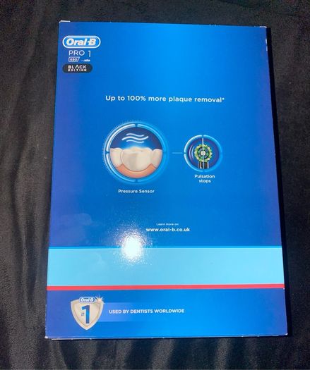 Oral B Pro 1 electric toothbrush with pressure sensor and travel case brand new