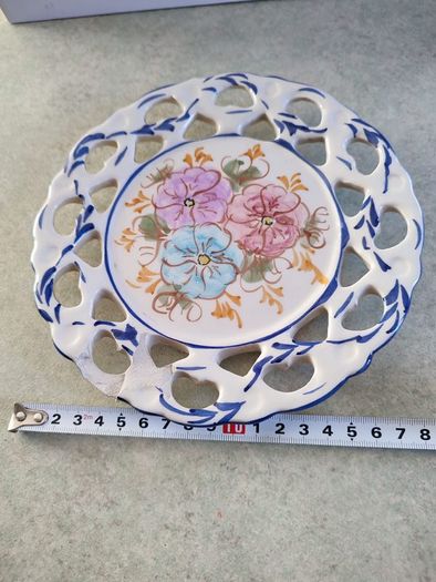 Vintage  19 cm. dimeter flowery  hinging wall plat made in Portugal.