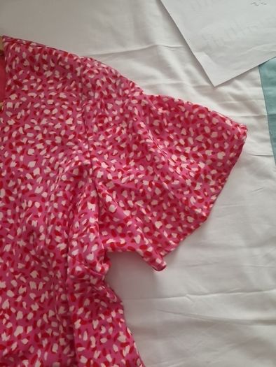 Pink midi dress.