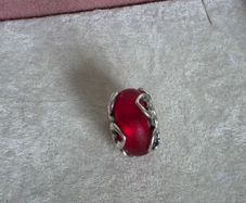 Pandora frosted red murano glass/hearts charm,very good condition hallmarked
