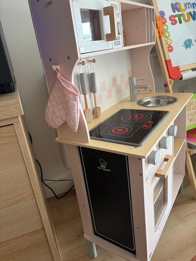Little girls pink wooden kitchen
