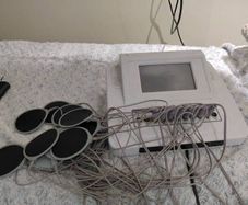 Professional EMS Body Slimming and Muscle Toning Machine : 10 Pads, Fully Working