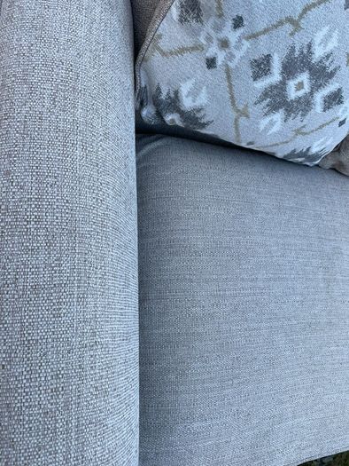 Beige L shaped corner sofa