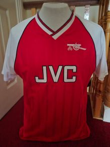 Arsenal official score draw retro shirt.