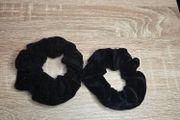 Two black velvet scrunchies