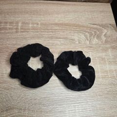 Two black velvet scrunchies