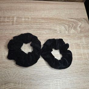 Two black velvet scrunchies