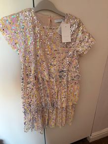 Beautiful Leigh tucker dress