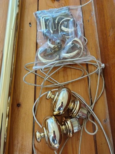 Brass coloured curtain track