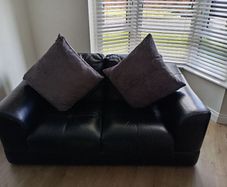 black Italian leather sofas