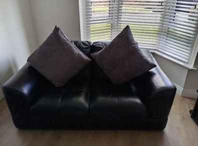 black Italian leather sofas