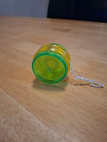Green-yellow plastic yoyo