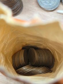 Bank bag of 6d coins