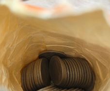 Bank bag of 6d coins