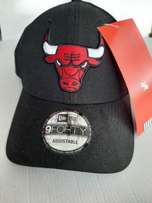 New baseball cap tags attached