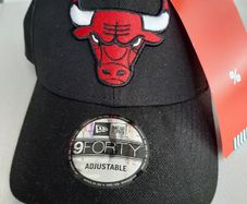 New baseball cap tags attached