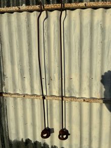 2 Antique pump piston plungers