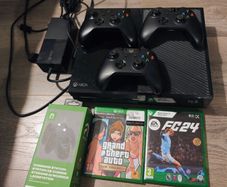 Xbox one with 3 controllers, games and charging station