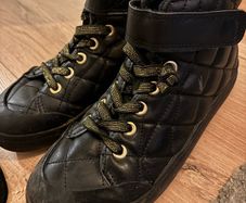 Several pairs of girl's shoes size 1