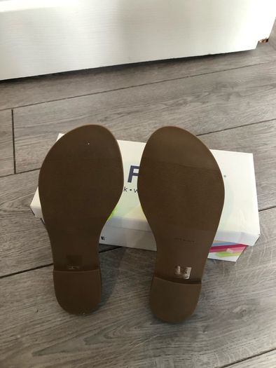 Brand new sandals from office.