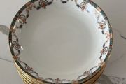 Set of 11 Limoges porcelain soup bowls