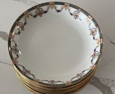 Set of 11 Limoges porcelain soup bowls