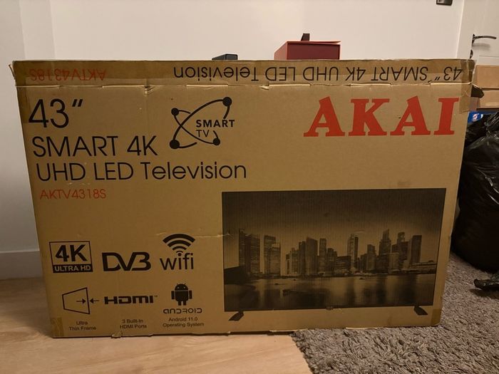 Tv with no remote (button can be used) and no stand.. Box included