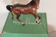 Vintage Royal Doultot porcelain horse. new in the box.