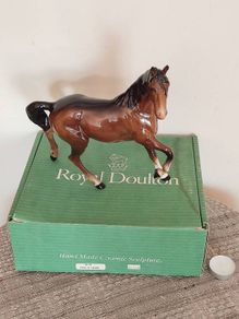 Vintage Royal Doultot porcelain horse. new in the box.