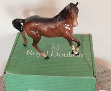 Vintage Royal Doultot porcelain horse. new in the box.