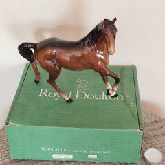 Vintage Royal Doultot porcelain horse. new in the box.