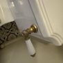 Traditional style brass bathroom taps and toilet flush handle Image 4