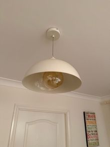 Cream pendant light fixture and large bulb