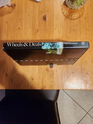 Wheels And Deals. People And Places In Irish Moterong. By John O' Donovan. First Edition Hardback With Dustjacket In Good Condition.