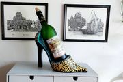 Stylish Ladies High Shoe Wine Bottle Holder Postage Available or Collection, High Spirits brand decorative resin wine bottle holder shaped like a high-heeled shoe