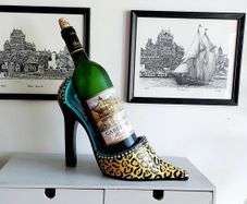 Stylish Ladies High Shoe Wine Bottle Holder Postage Available or Collection, High Spirits brand decorative resin wine bottle holder shaped like a high-heeled shoe