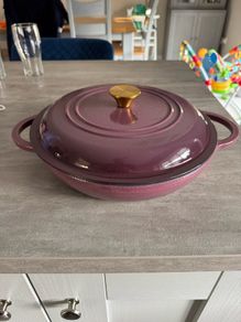 Shallow cast iron casserole dish