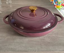 Shallow cast iron casserole dish