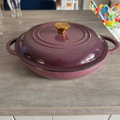 Shallow cast iron casserole dish