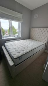 Small double ottoman bed