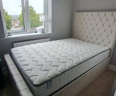 Small double ottoman bed