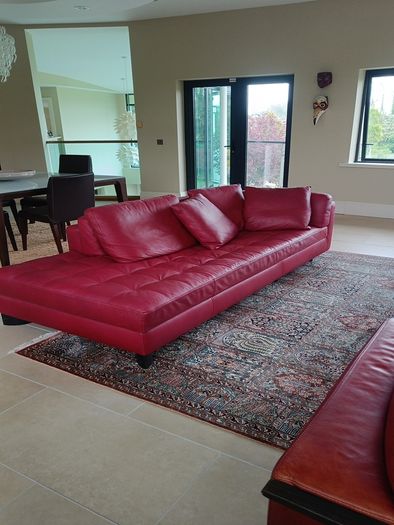 Natuzzi red leather corner sofa or can be separate as shown