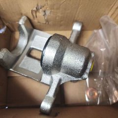 Hyundai ix35 rear left (passenger) brake caliper and alloy wheel