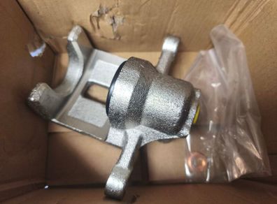 Hyundai ix35 rear left (passenger) brake caliper and alloy wheel
