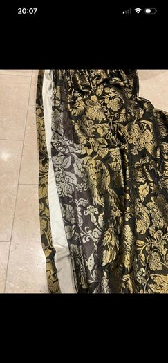 Pair of large lined black and gold curtains