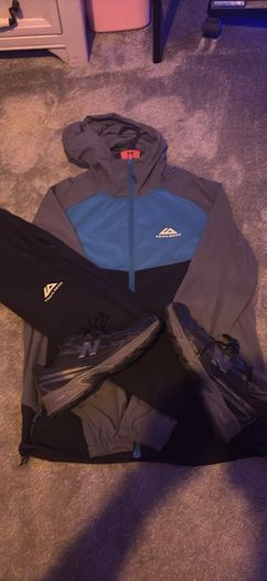 Trailberg Tracksuit and New Balance shoes