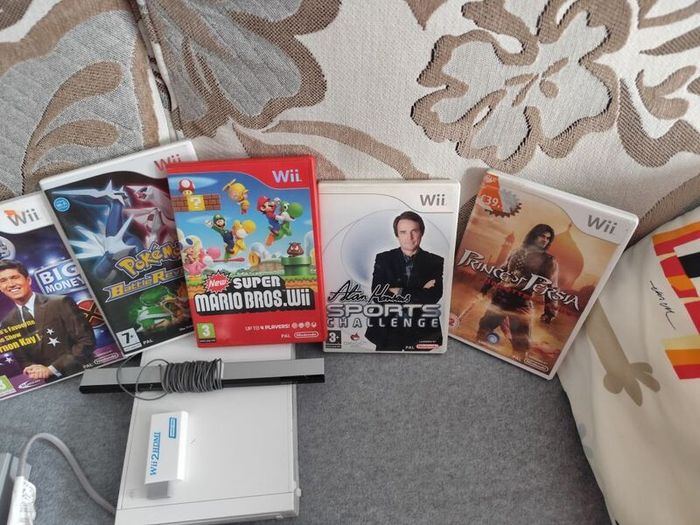 Wii with Mario Bros, Pokemon, Price of Persia
