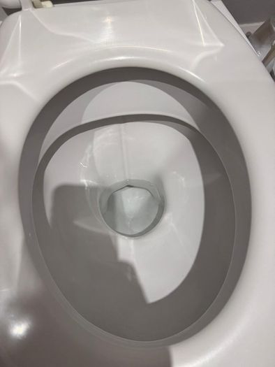 Bathroom sink, toilet, radiator