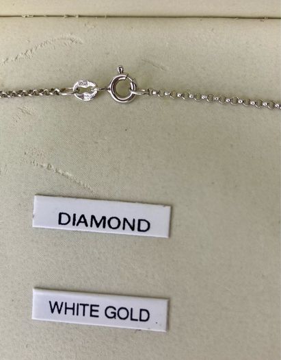 9ct White Gold 0.10ct Diamond and Blue Topaz Teardrop Pendant