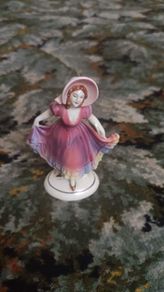 Vintage porcelain lady figurine with hat